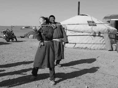 A young woman in Mongolia tries a Catatonk atlatl!